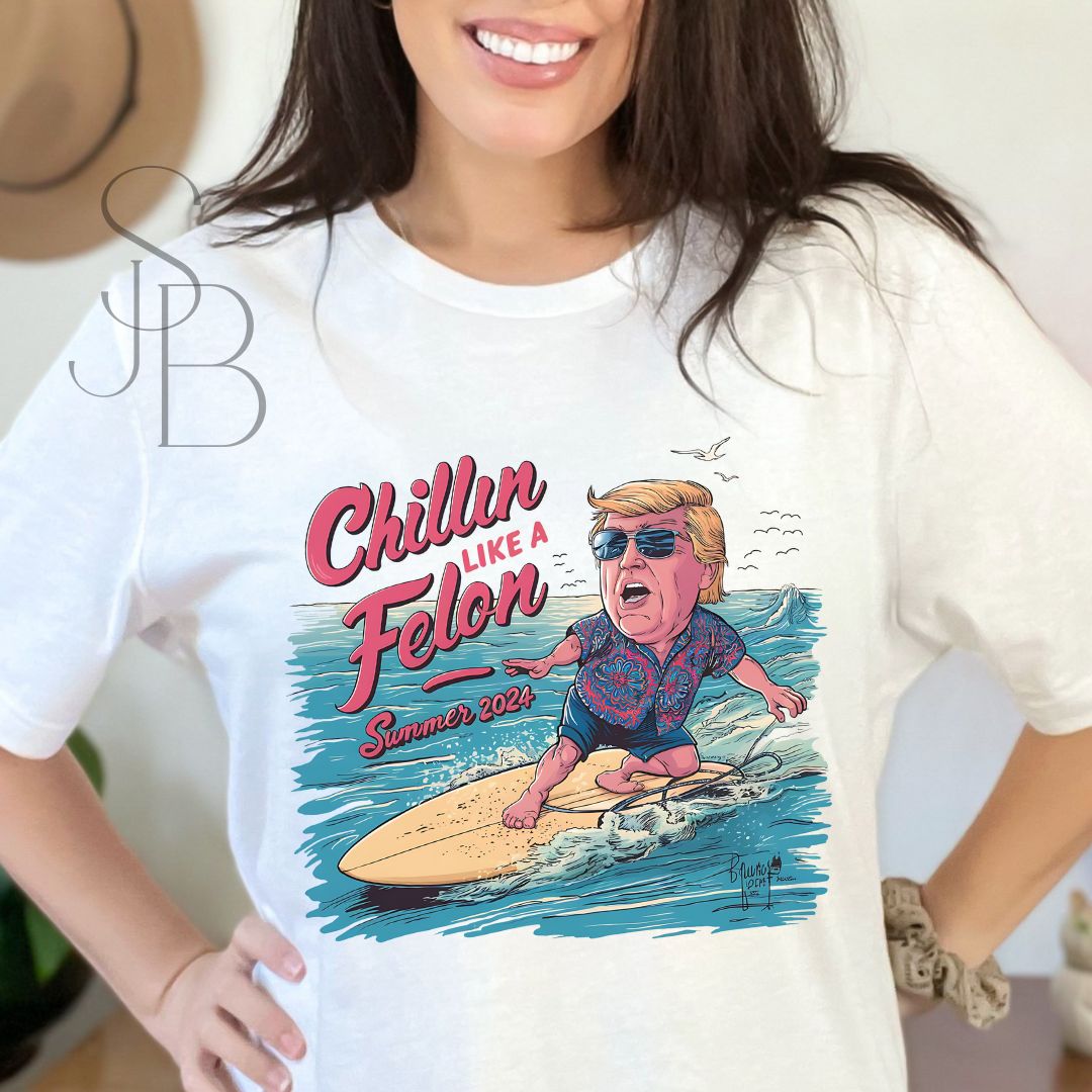 Chillin like a Felon - Trump on Surf Board - Trump Tee - Unisex Jersey Short Sleeve Tee