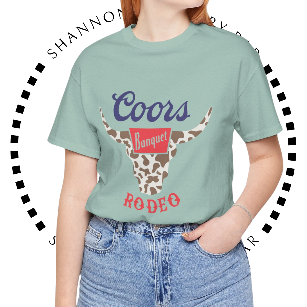Rodeo Coors Cow Skull with Cow Print- Unisex Jersey Short Sleeve Tee