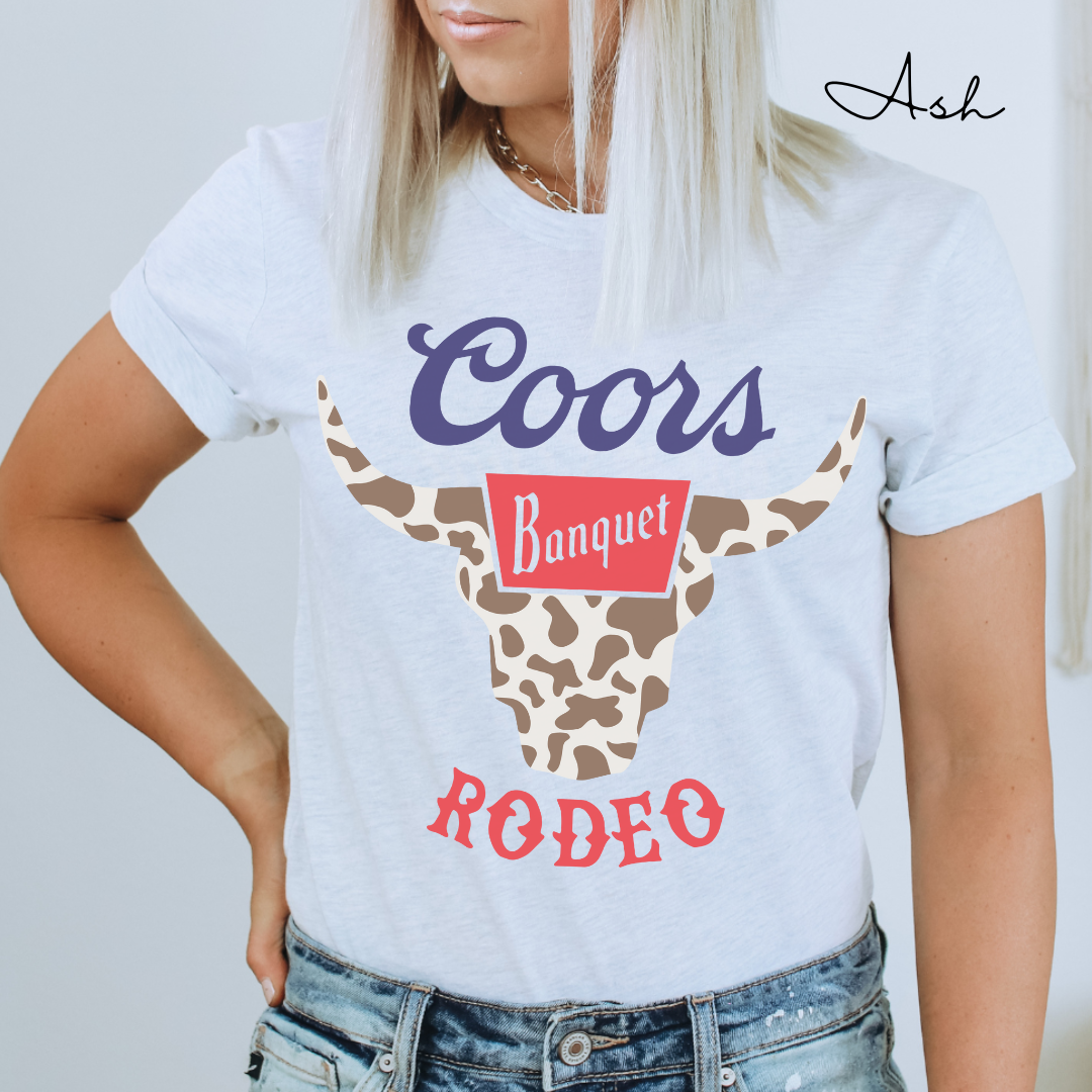 Rodeo Coors Cow Skull with Cow Print- Unisex Jersey Short Sleeve Tee