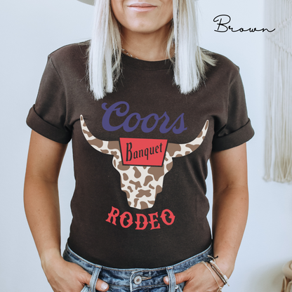 Rodeo Coors Cow Skull with Cow Print- Unisex Jersey Short Sleeve Tee